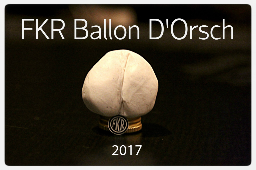 Über einer stilisierten Büste eines menschlichen Gesäßes steht FKR Ballon d'Orsch geschrieben, darunter 2017